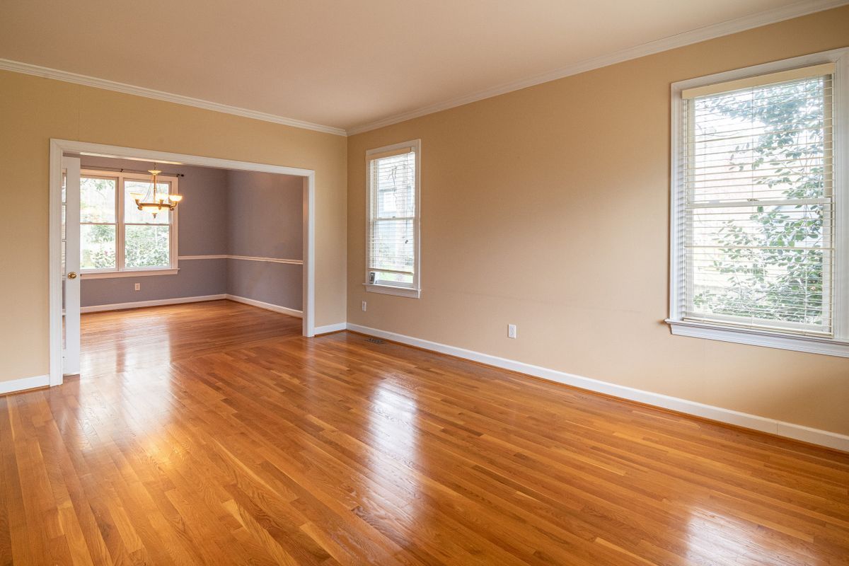 Empty room with polished hardwood floor